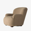Four hands furniture brand 'Kadon' large armchair with camel color sheepskin style upholstery on a white background