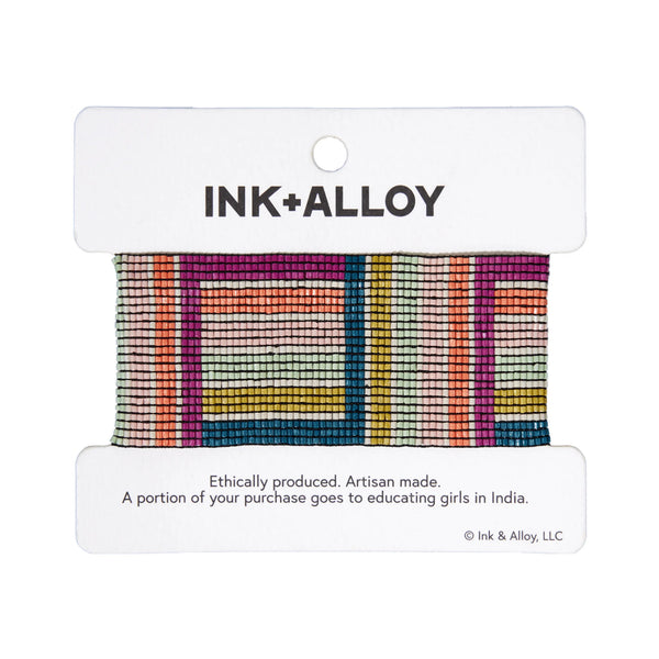 Ink and alloy brand 'Brooklyn' stretch bracelet in multicolor blocks on a white background