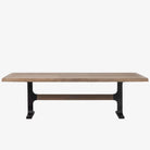 Mercana brand Axari Large rectangular wood dining table with trestle style iron base on a white background