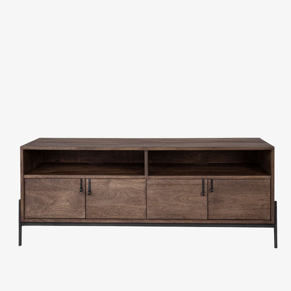 Brown wood media console with black metal legs and four doors and rustic pulls on a white background