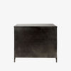 Small black metal cabinet with glass doors and cross hatch mullion design on a white background