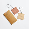 PF Candle Amber and Moss Car Fragrance hang tags on a white background