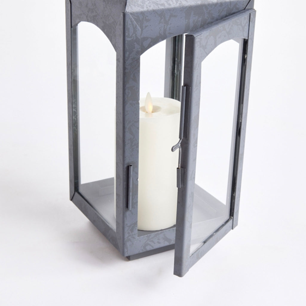 Zinc metal square outdoor lantern with arched top handle on a white background