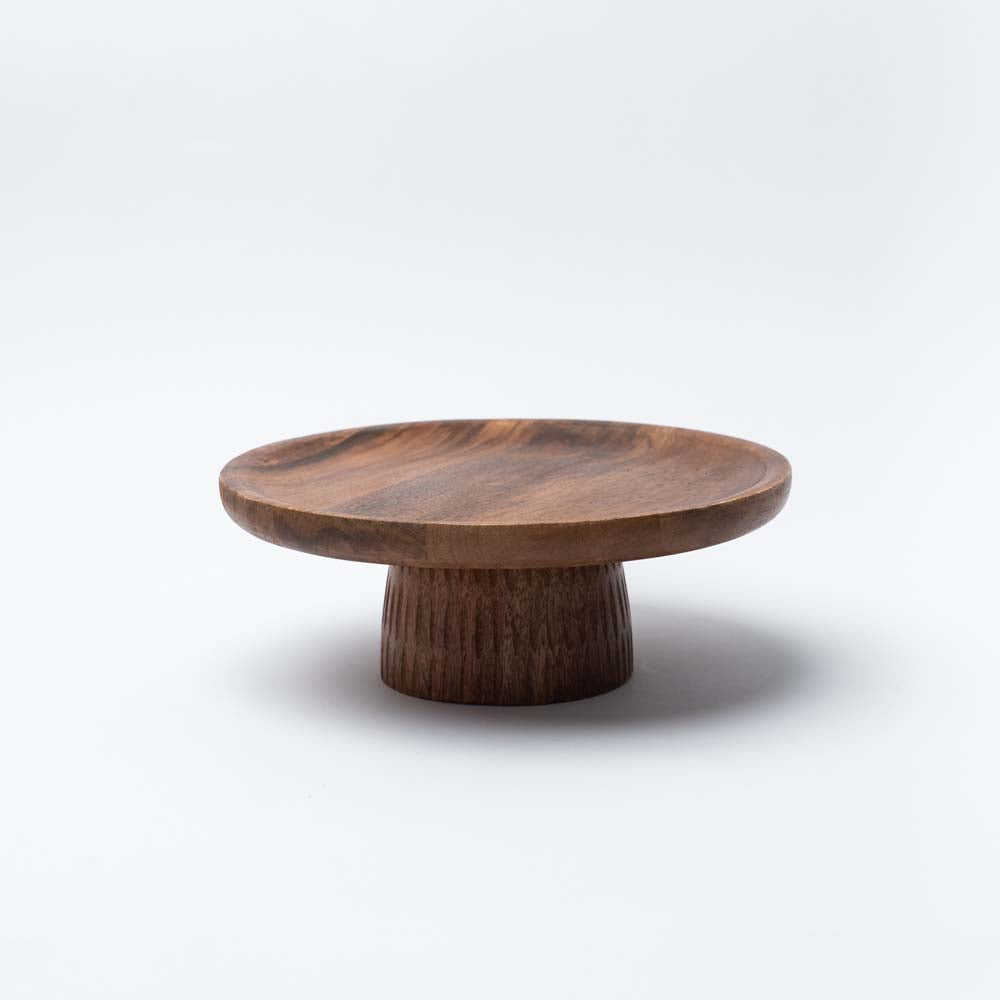 Hand carved Mango Wood Cake Stand on a white background