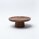 Hand carved Mango Wood Cake Stand on a white background
