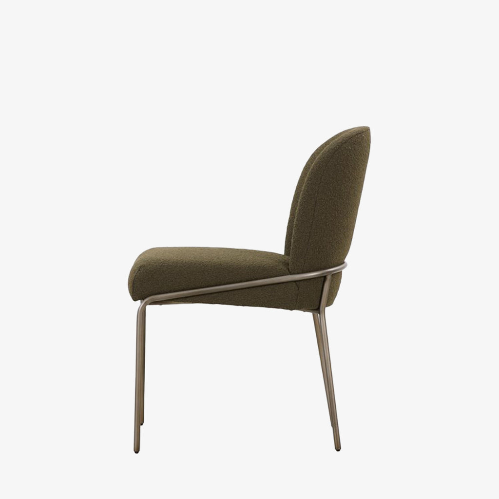 Side view of Four Hands Brand Astrud dining chair with boucle olive fabric seat and back and iron legs on a white background