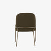 Four Hands Brand Astrud dining chair with boucle olive fabric seat and back and iron legs on a white background