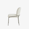 Four Hands Brand Astrud dining chair with pewter fabric seat and back and iron legs on a white background