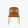 Four Hands Brand Astrud dining chair with brown leather seat and back and iron legs on a white background
