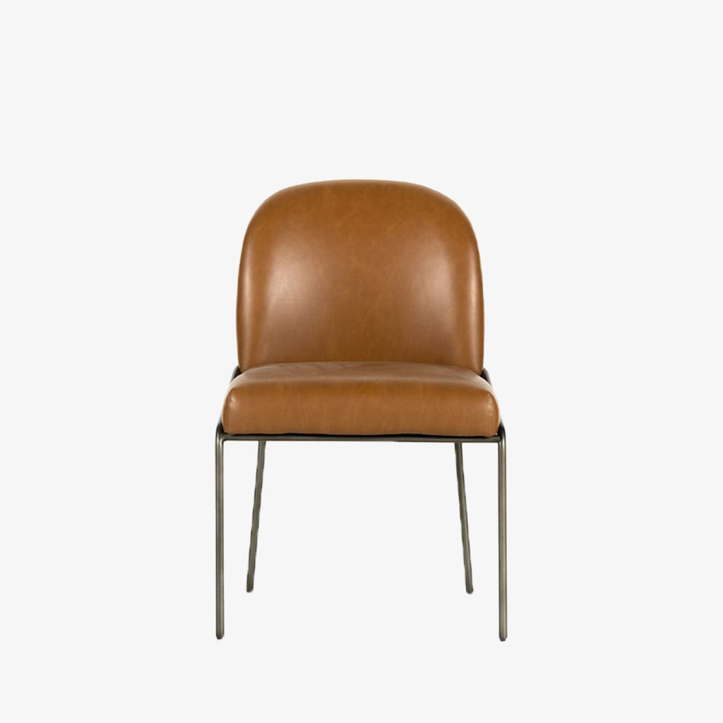 Four Hands Brand Astrud dining chair with brown leather seat and back and iron legs on a white background