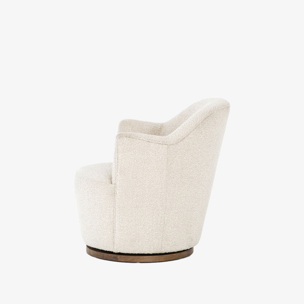 Side view of Aurora swivel chair in Knoll natural creme color by Four Hands Furniture brand with wood base on a white background