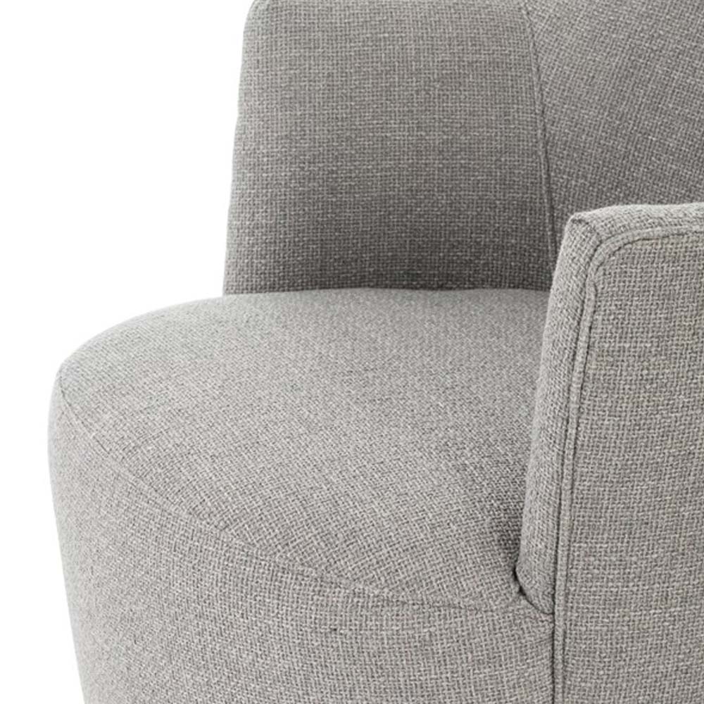 Close up of seat and arms on Aurora Gibson Silver swivel chair by four hands brand with wood base on a white background