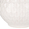 Close up of Surya Blakey table lamp with round white base and linen shade on a white background