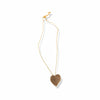 Necklace with brass heart pendant on a white background