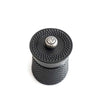 Close up of top of Peugeot Bali Fonte black cast iron pepper mill on a white background