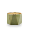 Illume 'Dylan' green ceramic balsam and cedar scented candle on white background 