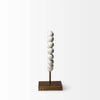 Side view of Mercana beaded broken sphere object in white with gold base on white background