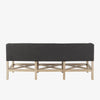 Grey upholstered accent bench with trellis wood base and small bolster back and nail head finish