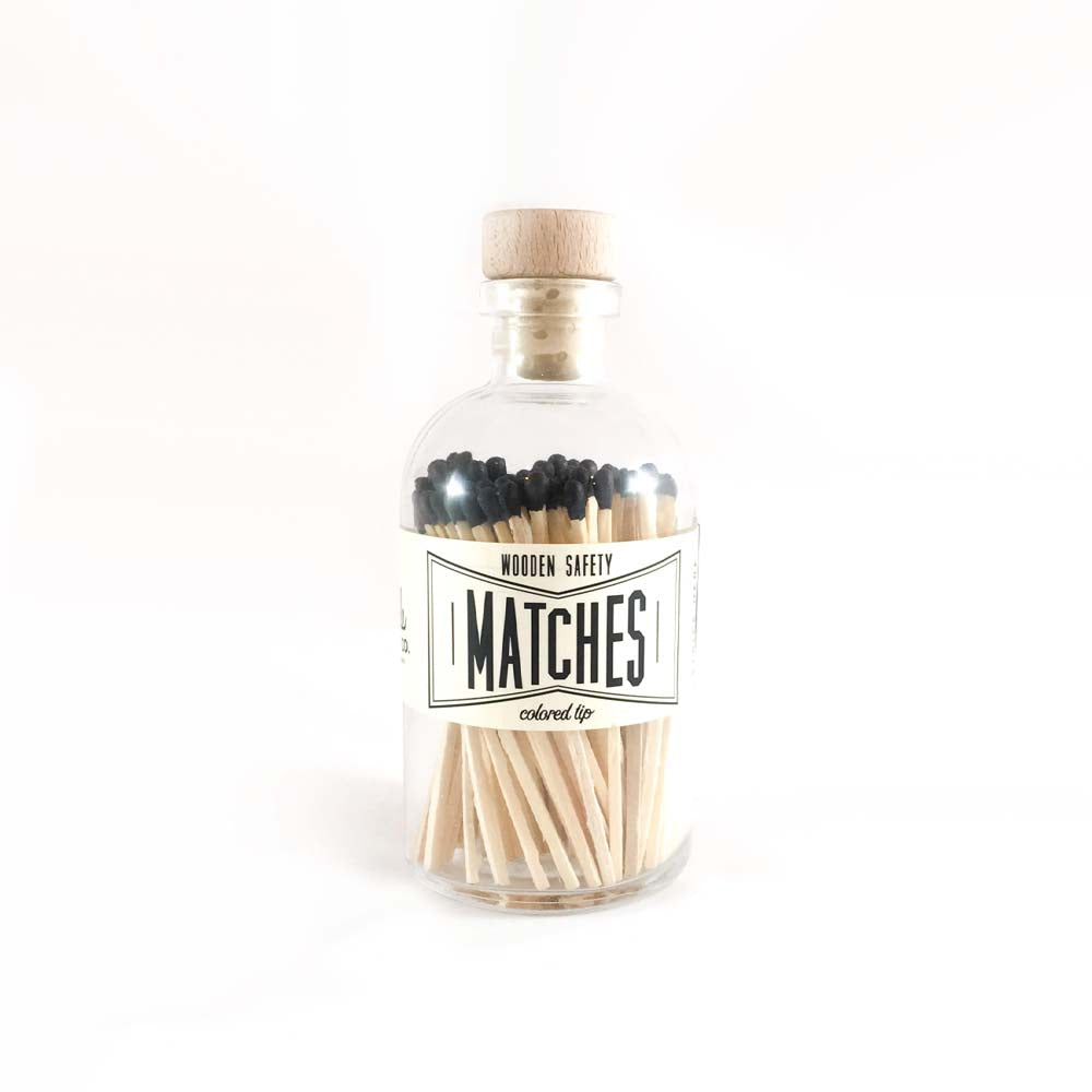 Wood Black tip matches in glass bottle with cork top