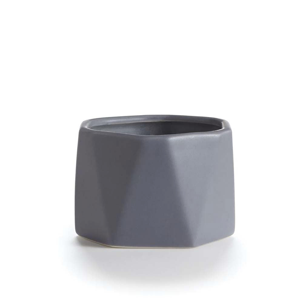 Illume Blackberry absinthe candle in grey ceramic vessel on a white background