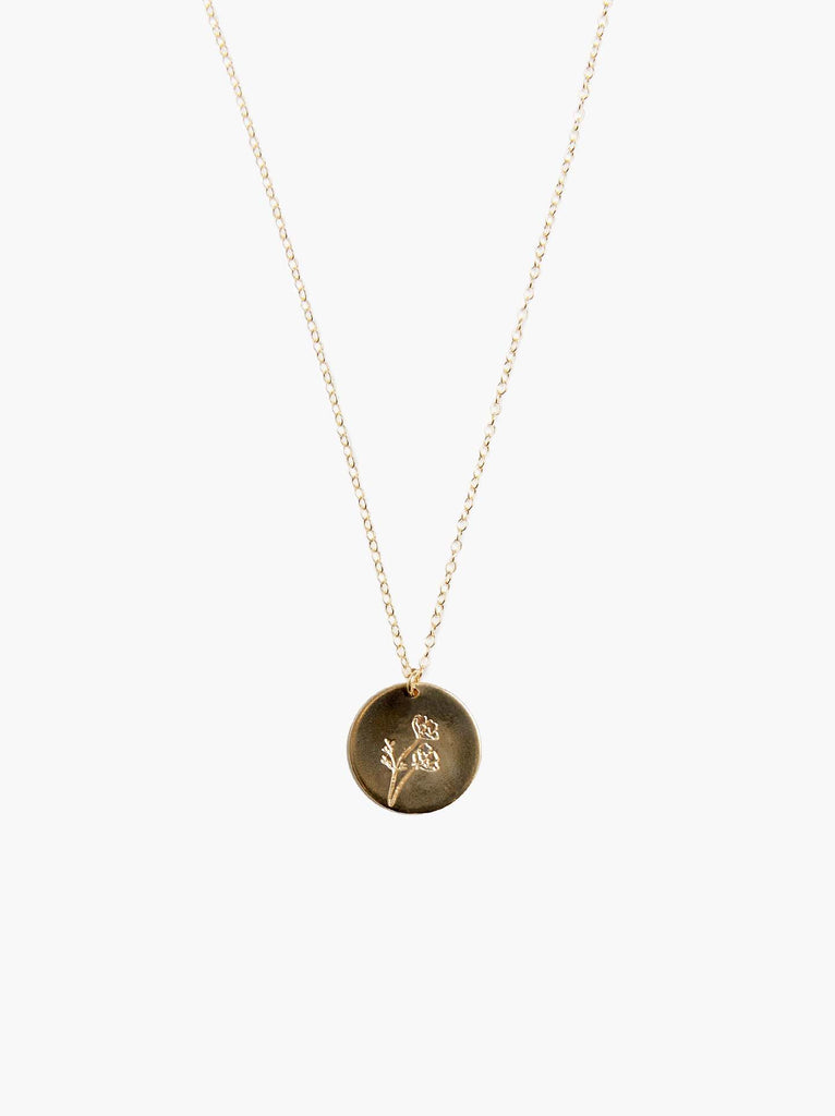 Able brand Bloom birth month poppy necklace in 14 carat gold fill on a white background