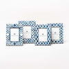 Two's company Blue mosaic picture frames with geometric patterns on a white background