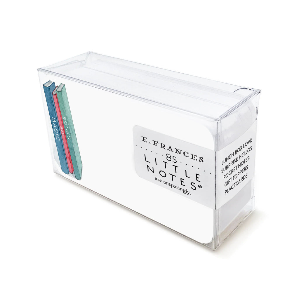 E francés brand little note cards with stack of books in clear box on a white background