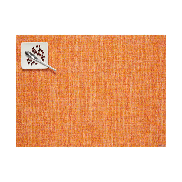 Chilewich boucle rectangle placemat in tangerine orange on a white background