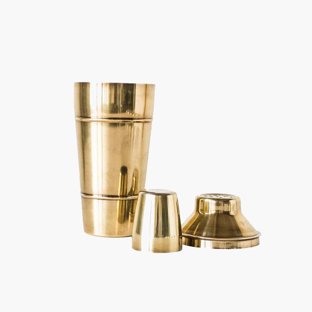 Gold Stainless Steel Cocktail Shaker on a white background