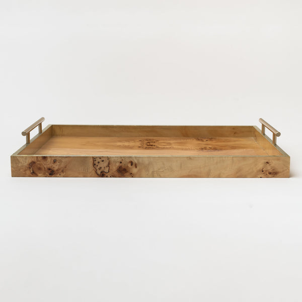 Burl wood tray with brass handles on a white background