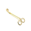 Brass colored candle wick trimmer on a white background