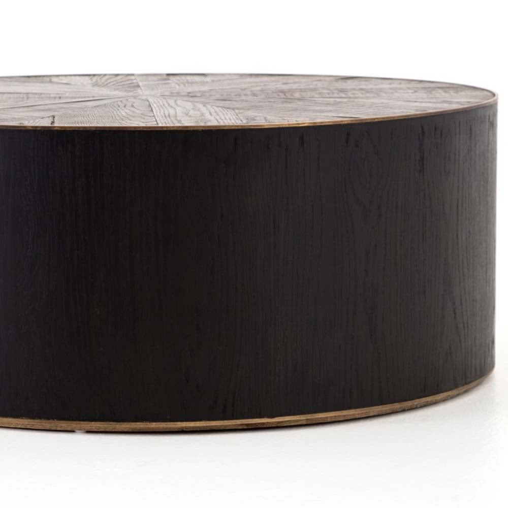 Dark wood 'Perry' coffee table with wood inlay and brass detailing by four hands furniture on a white background