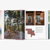 Inside pages of Taschen Cabins book on a white background