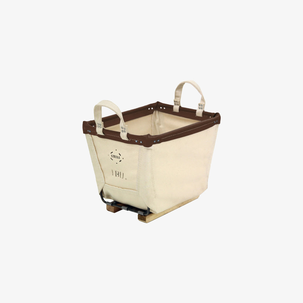 Steele small canvas carry basket with leather trim on a white background