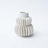 White Handmade Pleated Stoneware Vase on a white background