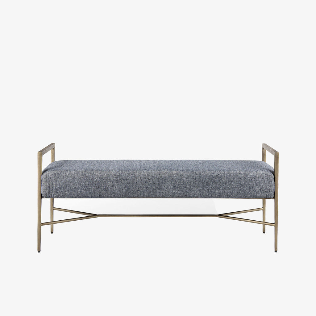 Bench with metal frame and grey upholstered seat on a white background