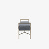 Bench with metal frame and grey upholstered seat on a white background