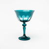 Sir Madam Rialto glass coupes in millicent green on a white background