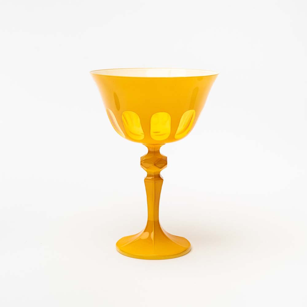 Sir Madam Rialto glass coupes in saffron on a white background