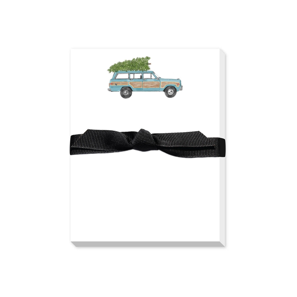 Notepad with station wagon and christmas tree on top 