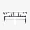 Back view of Black metal bench with Windsor chair styling and curves back rail on a white background