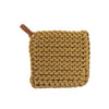 Thick mustard colored crocheted pot holders with leather loop on a white background