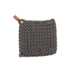 Charcoal grey crocheted pot holder with leather loops on a white background