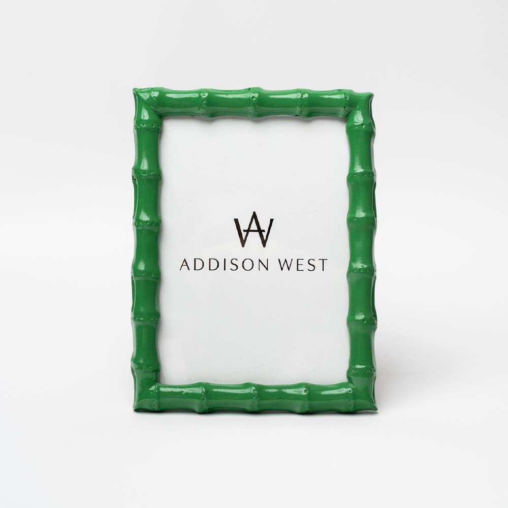 Green picture frame with bamboo wood style edge on a white background