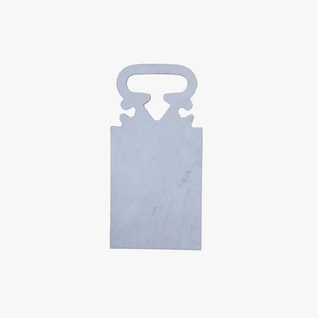 White marble serving board with baroque style handle on a white background