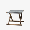 Foldable stool with wood frame and striped canvas seat