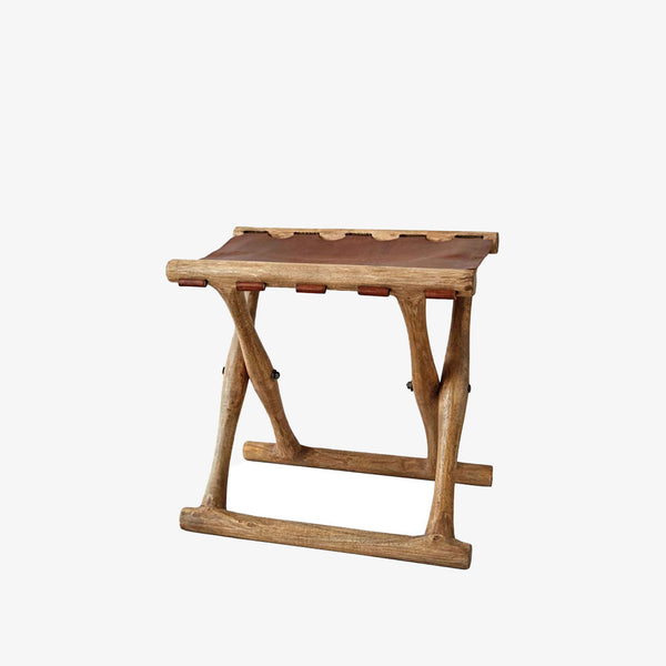 Leather and wood folding stool on a white background