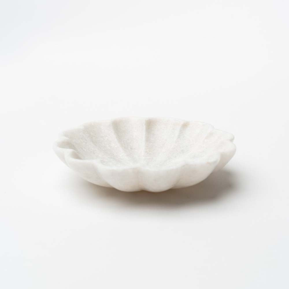 Flower marble dish on a white background