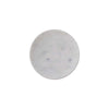 Round marble soap dish on a white background viewed from above