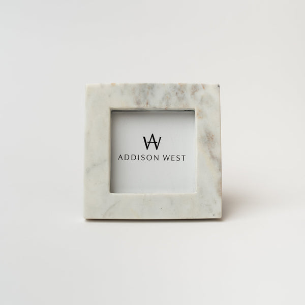 Square white marble picture frame on a white background